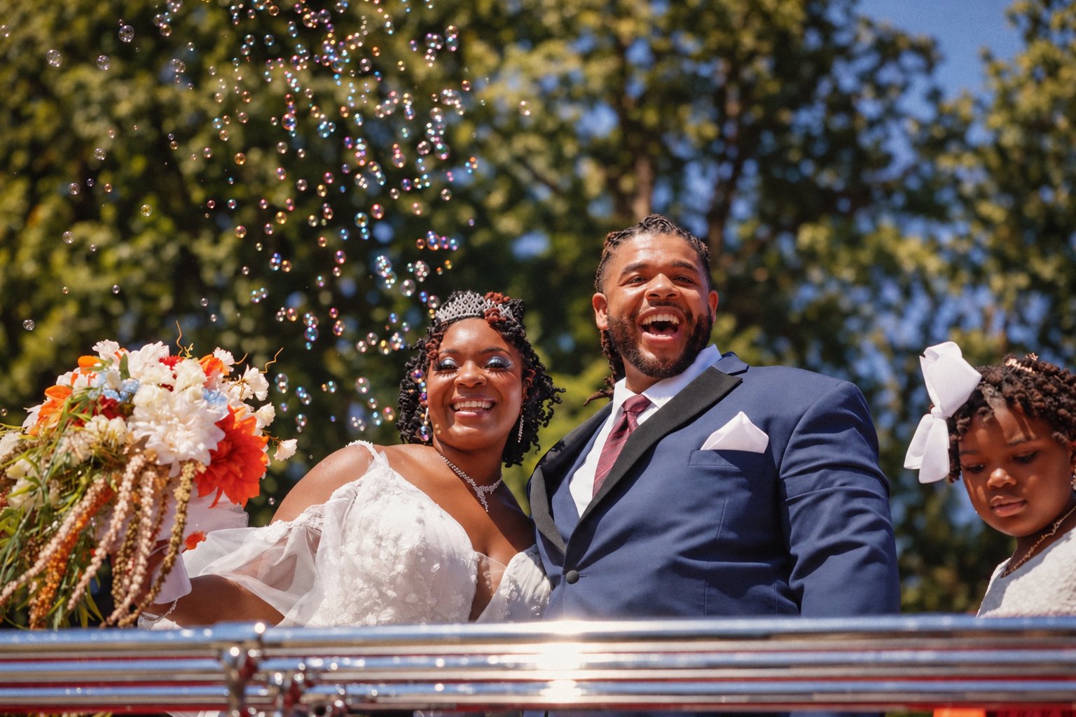 Newlyweds laughing through a bubble send-off