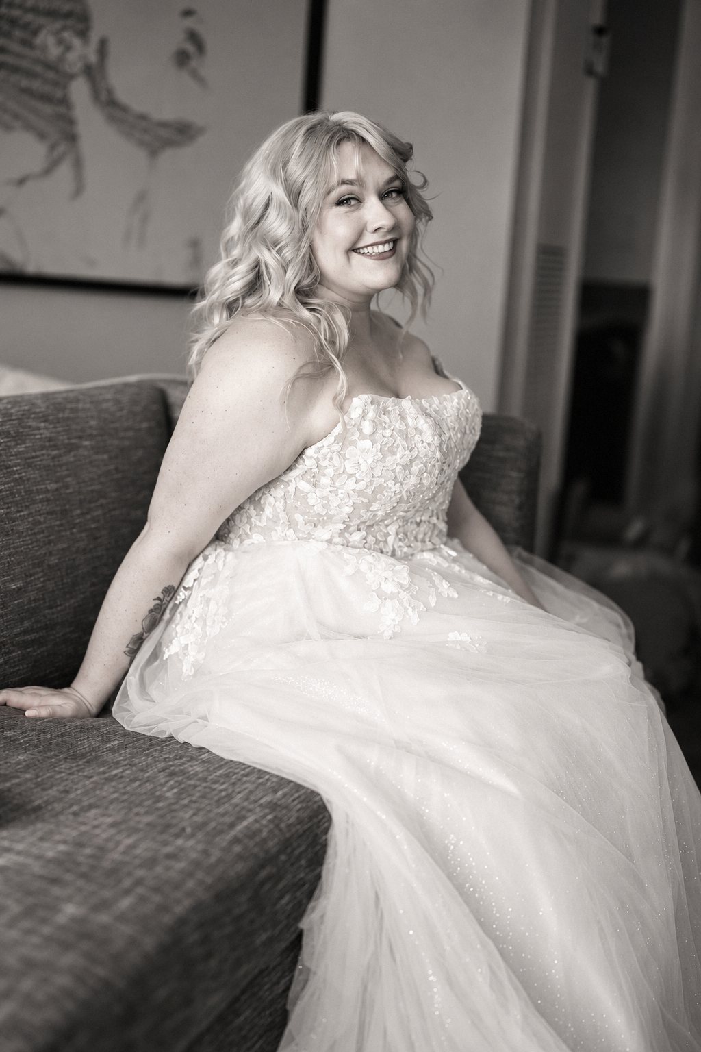 Black and white portrait of a smiling bride