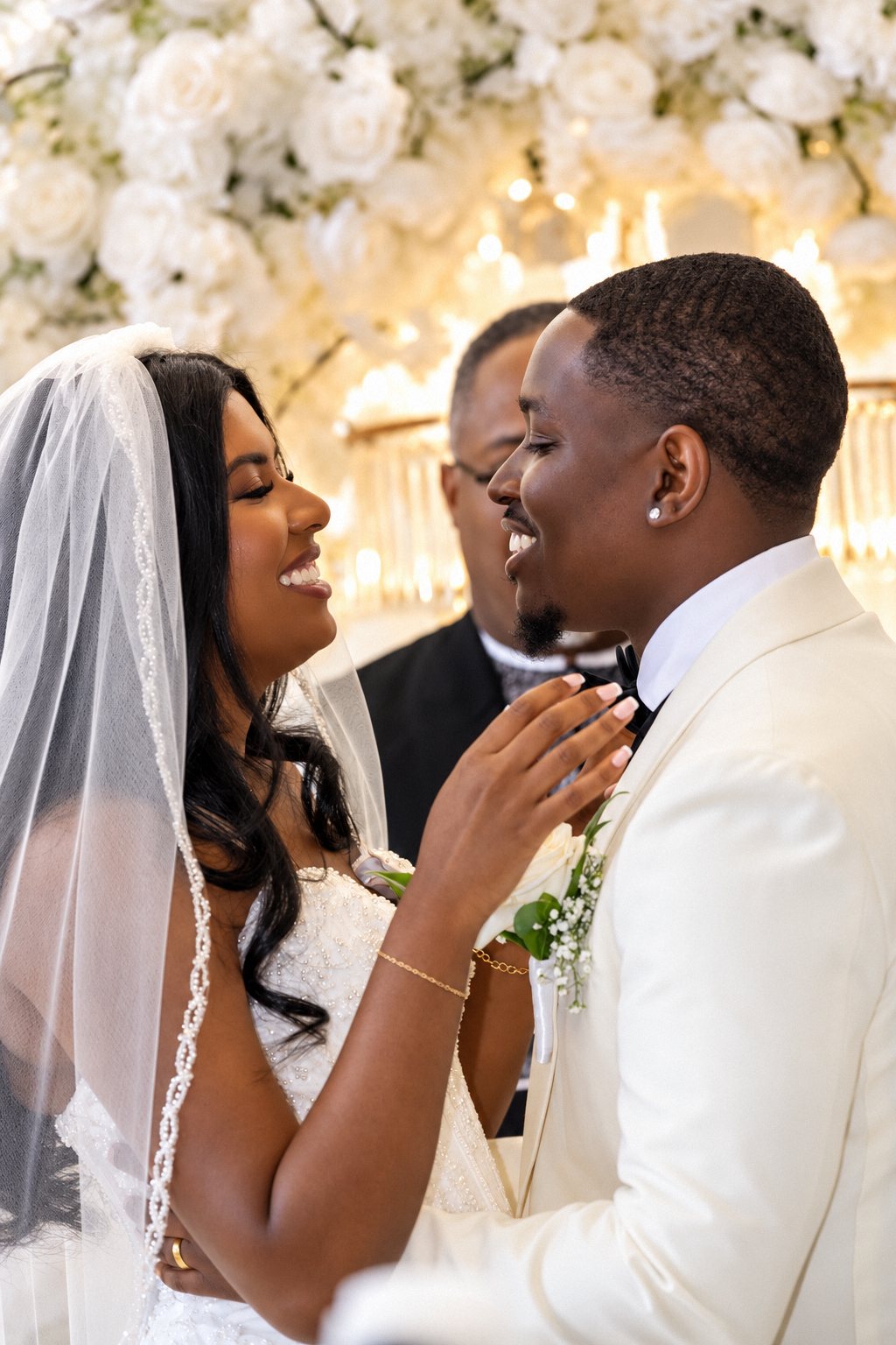 Bride and groom laughing at the altar