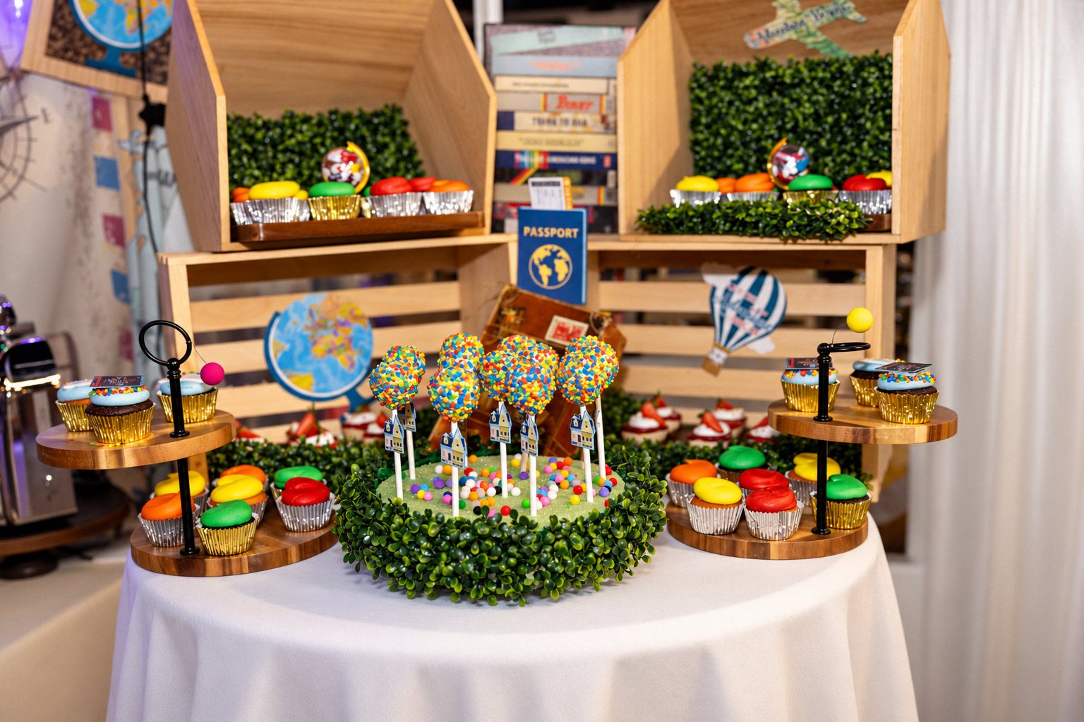 Dessert table with cake pops and cupcakes