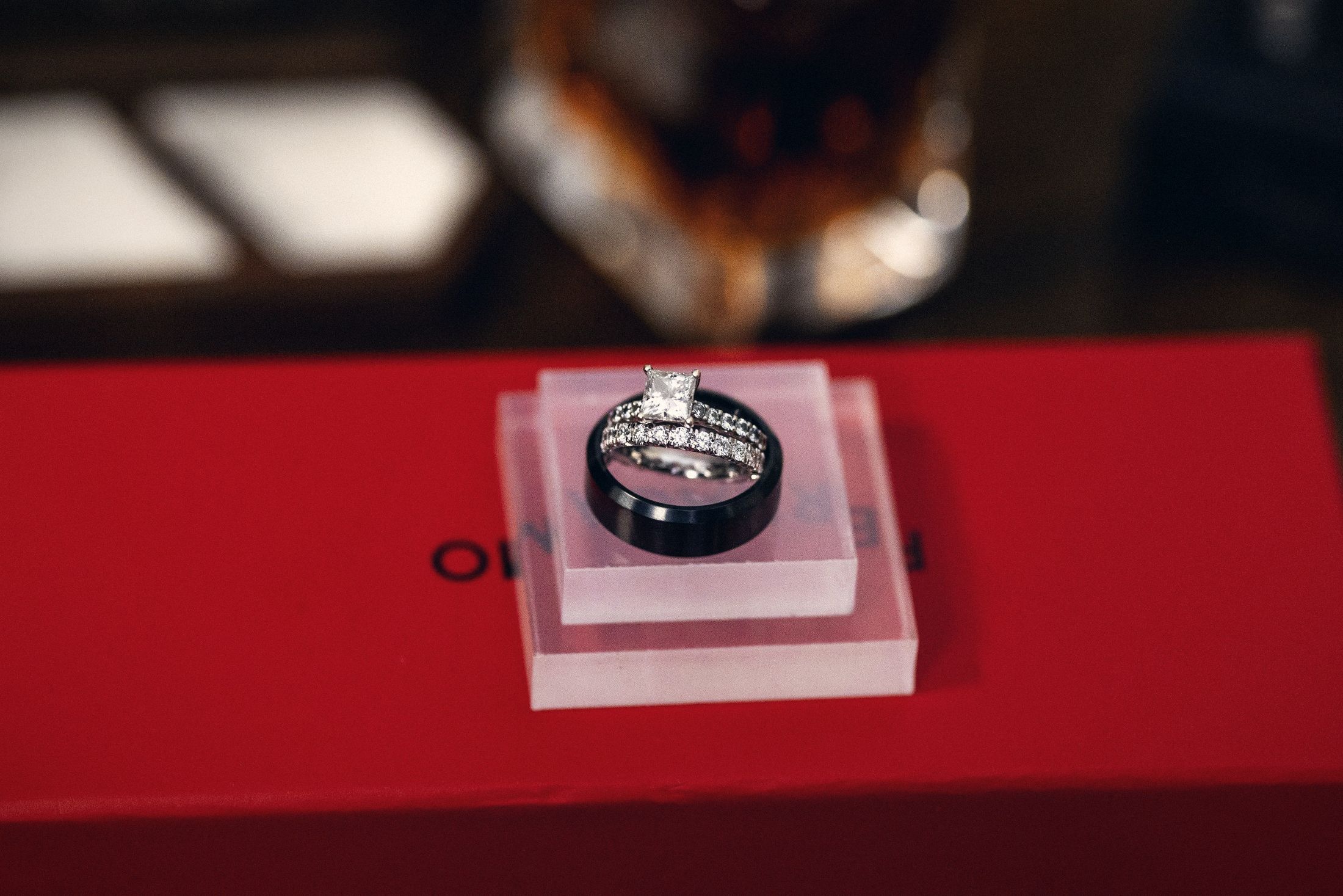 Wedding bands displayed on a red ring box